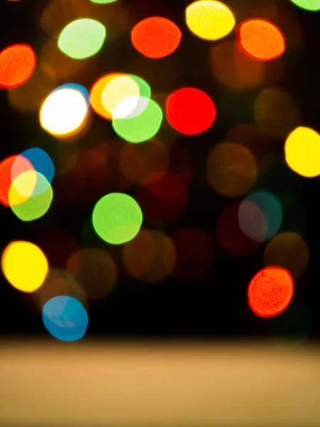 Lichte bokeh met een zwarte achtergrond. — Stockfoto