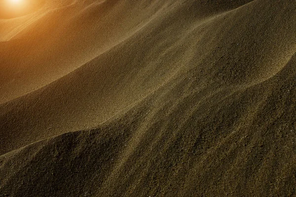 Sand bakgrundsstruktur. — Stockfoto