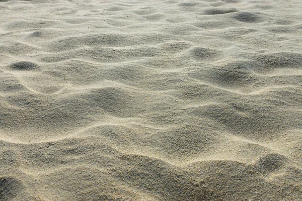 Sand bakgrundsstruktur. — Stockfoto