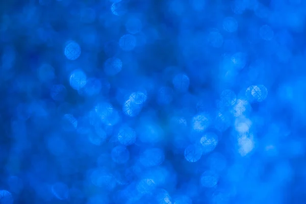 Blauer Bokeh Hintergrund mit Licht. — Stockfoto