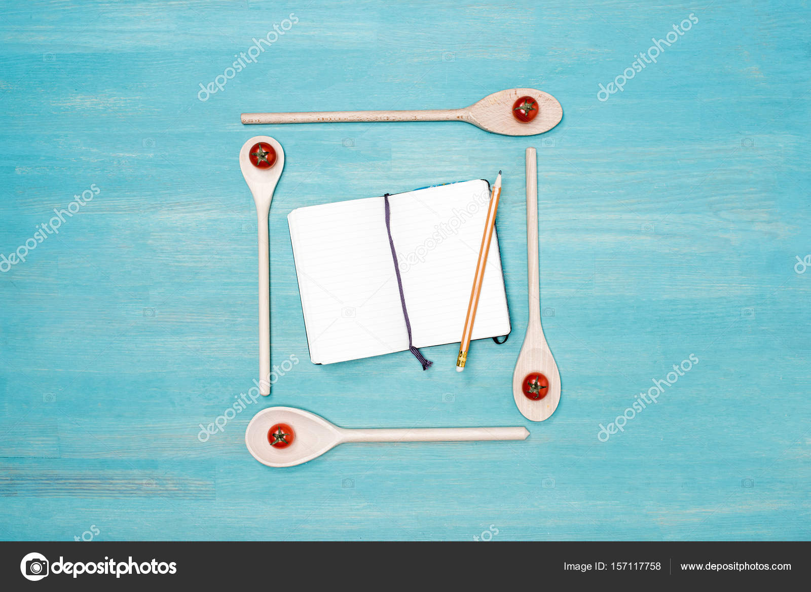 Top View Of Wooden Spoons With Cherry Tomatoes And Blank Open