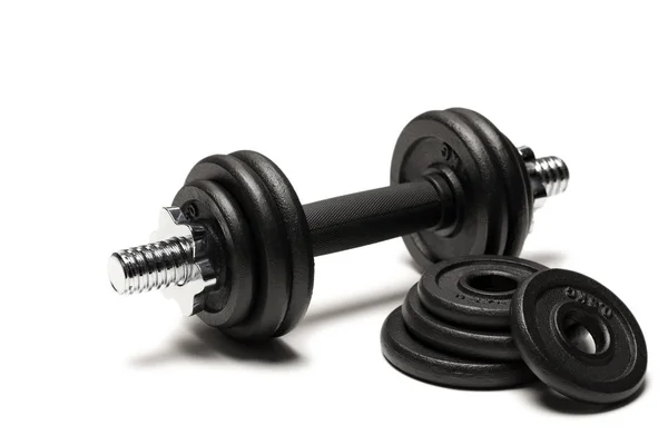 Iron dumbbell with weight plates — Stock Photo, Image