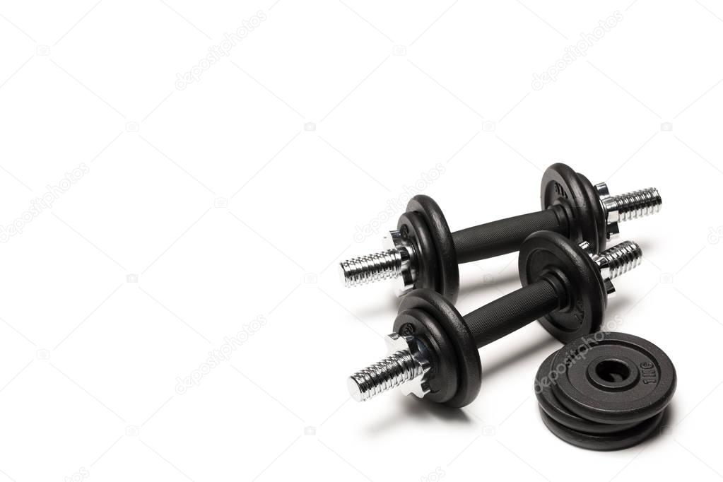 iron dumbbells with weight plates