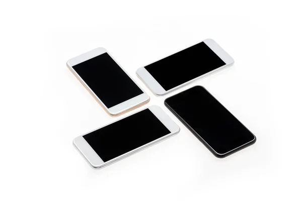 Modern smartphones with black screens — Stock Photo, Image