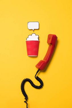 Telephone handset and paper cup clipart