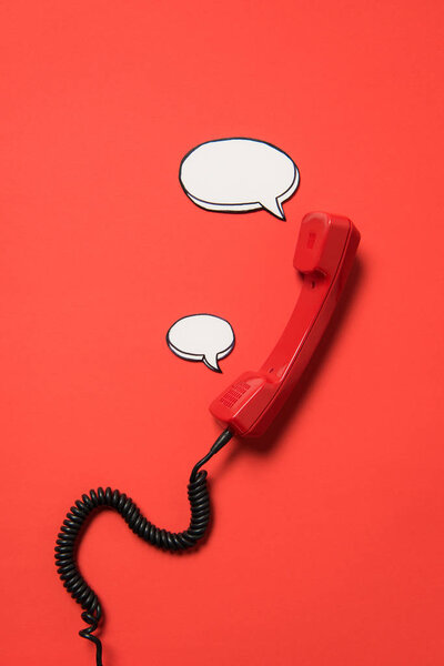 Telephone handset and speech bubbles