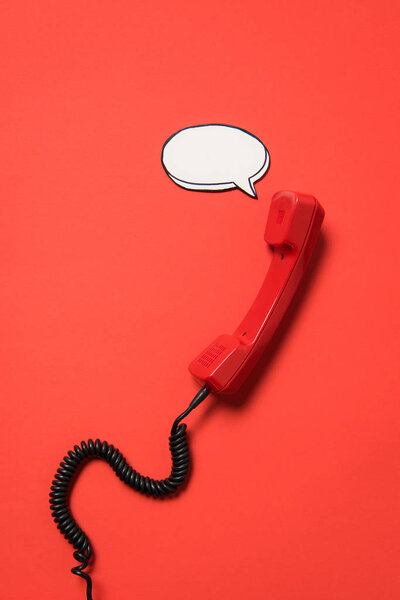 Telephone handset and speech bubble