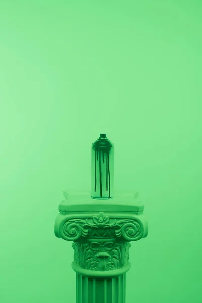 Green toned picture of aerosol paint in can on column — Stock Image Green Toned Picture Aerosol Paint Can Column Stock Image