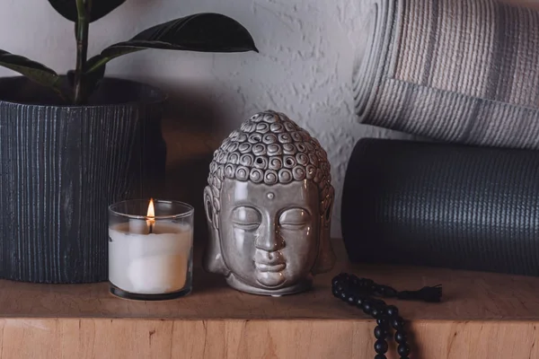 Sculpture Buddha Head Yoga Mats Wooden Shelf — Stock Photo, Image