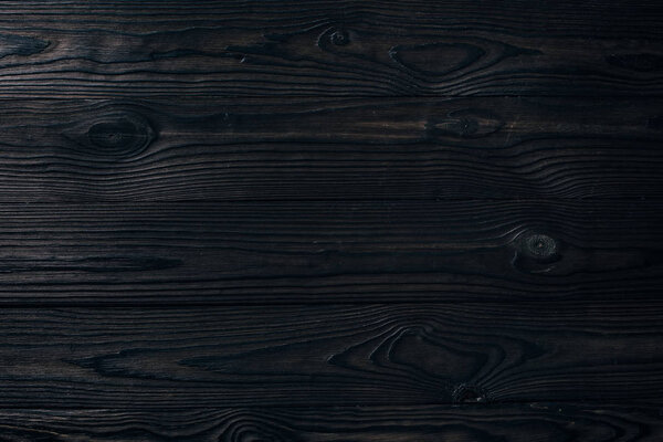 close up view of blank dark wooden background