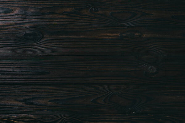 close up view of blank dark wooden background