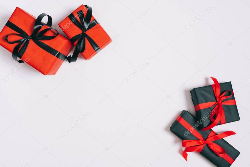 top view of wrapped gifts isolated on grey, st valentines day concept
