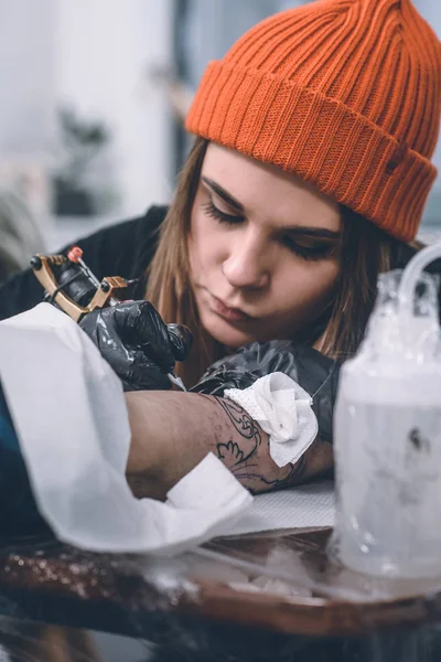 Professional Tattooing Process Arm Piece — Free Stock Photo