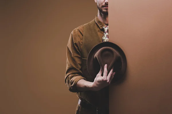 Stylish Man Wearing Coat Holding Hat Isolated Brown — Stock Photo, Image