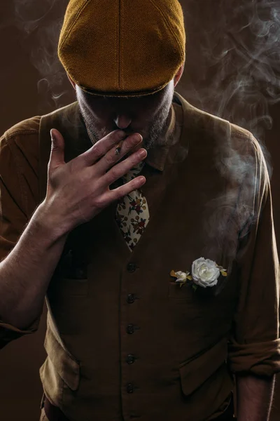 Stylish Man Flat Cap Smoking Cigarette Isolated Brown — Free Stock Photo