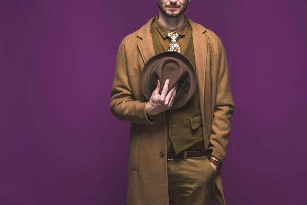 Stylish Man Wearing Coat Holding Hat Isolated Purple — Stock Photo, Image