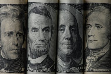 close up view of american presidents on dollar banknotes clipart