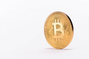 Close up view of golden bitcoin isolated on white clipart