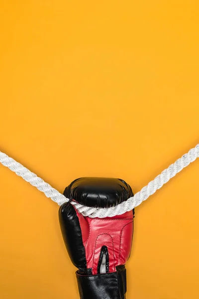 Boxing glove hanging on rope — Stock Photo