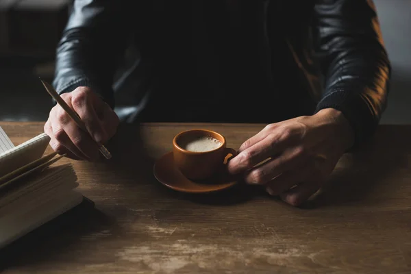 Person drinking coffee — Stock Photo