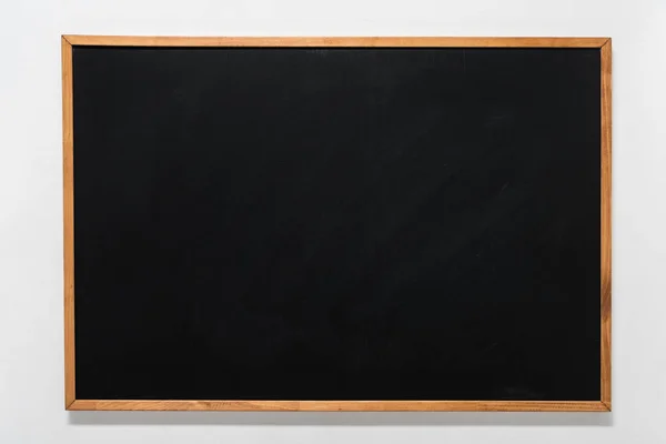 Empty school blackboard in wooden frame — Stock Photo