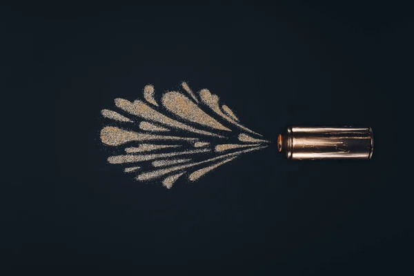Top view of aerosol paint in can and splashes isolated on black — Stock Photo