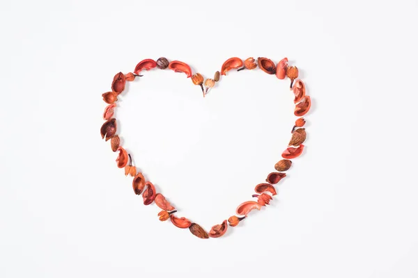 Top view of heart from dried fruits isolated on white — Stock Photo