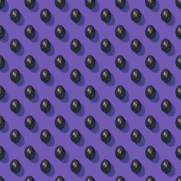 Set of painted easter eggs on purple — Stock Photo