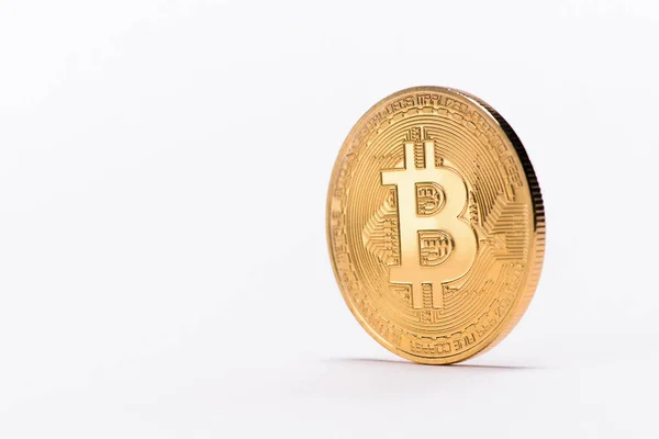 Close up view of golden bitcoin isolated on white — Stock Photo