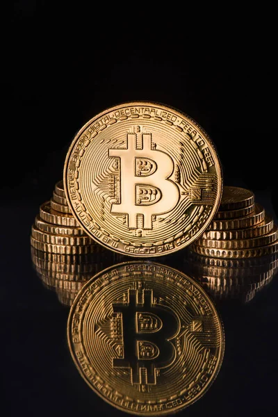 Close up view of golden bitcoins isolated on black — Stock Photo