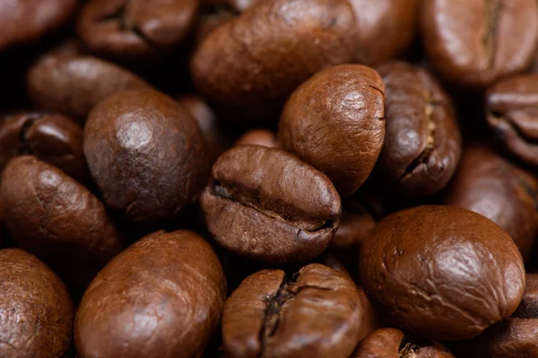 Cadre complet de grains de café torréfié toile de fond — Photo de stock
