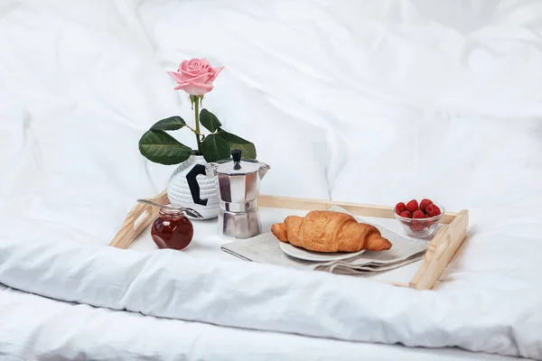 Tray with breakfast on bed — Stock Photo, Image