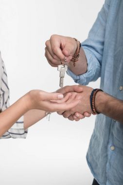 Young couple with keys  clipart