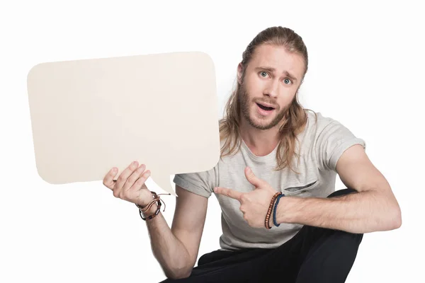 Man holding empty speech bubble — Stock Photo, Image