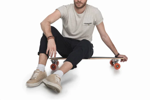 Young man with longboard — Free Stock Photo