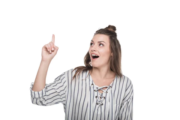 Excited woman pointing up — Stock Photo, Image