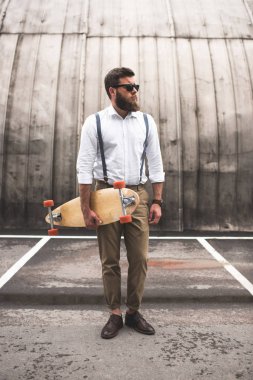 stylish man with longboard clipart