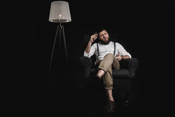 Bearded man smoking cigar — Stock Photo, Image