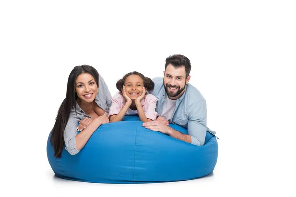 Family lying on bag chair — Stock Photo, Image