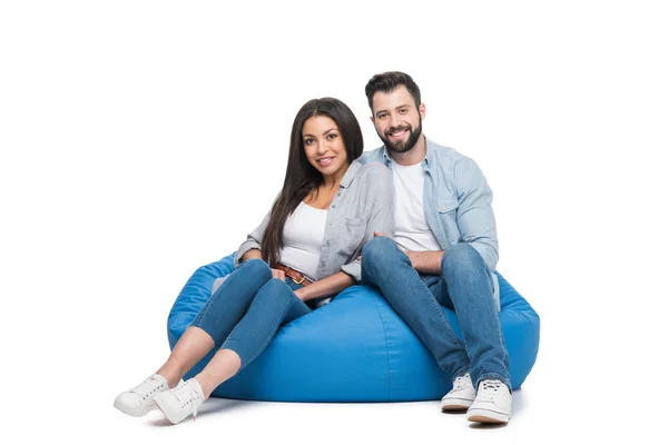 Couple sitting on bag chair — Stock Photo, Image