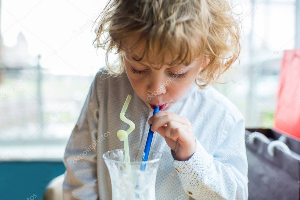 boy drinking milkshake