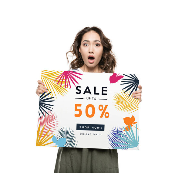 woman holding sale banner 