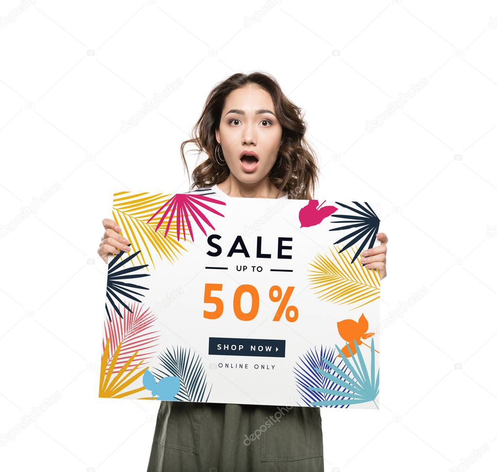 woman holding sale banner 