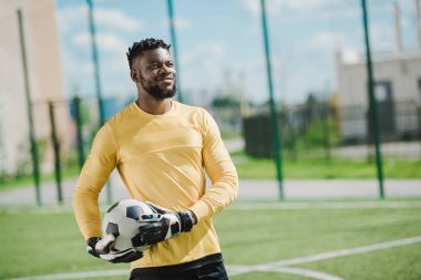 african american goalkeeper with ball clipart