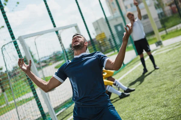 Upset soccer player — Stock Photo, Image