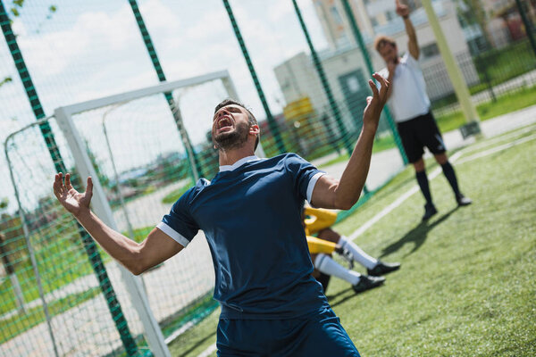 upset soccer player