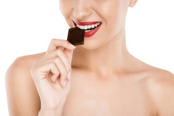 Woman eating chocolate — Stock Photo, Image