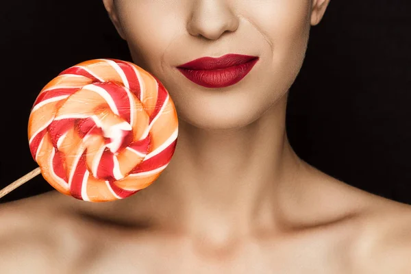 Beautiful woman with lollipop — Stock Photo, Image