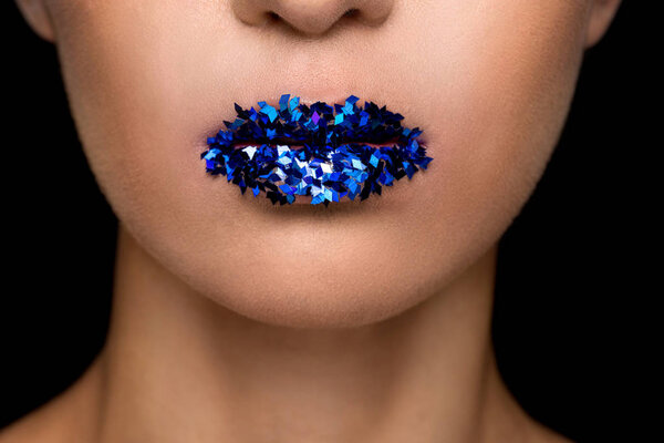 fashionable woman with sparkles on lips