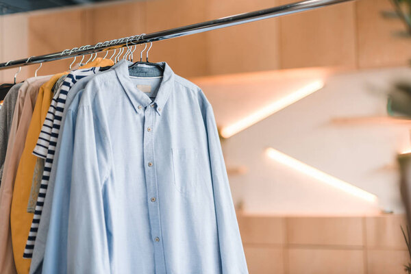 stylish clothes on hangers